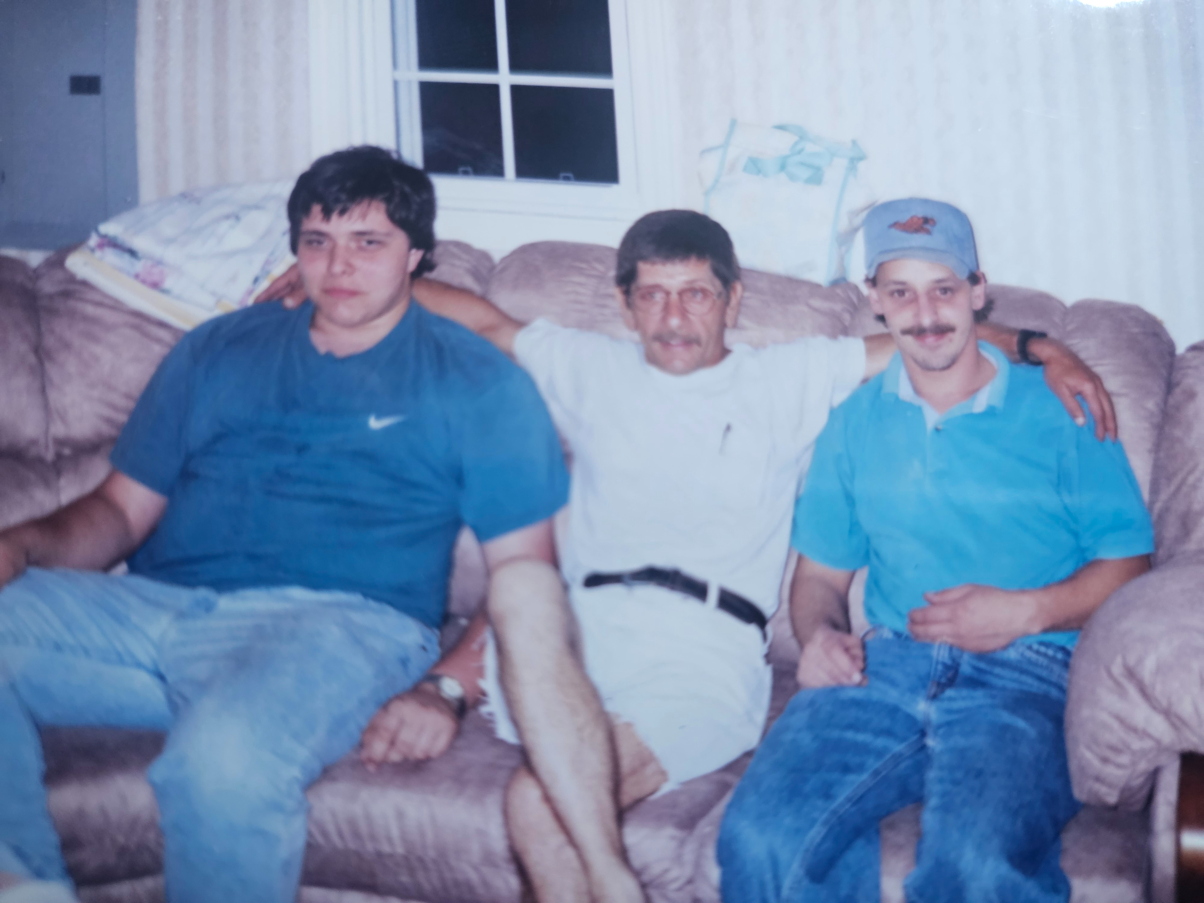 Gary and two men on couch