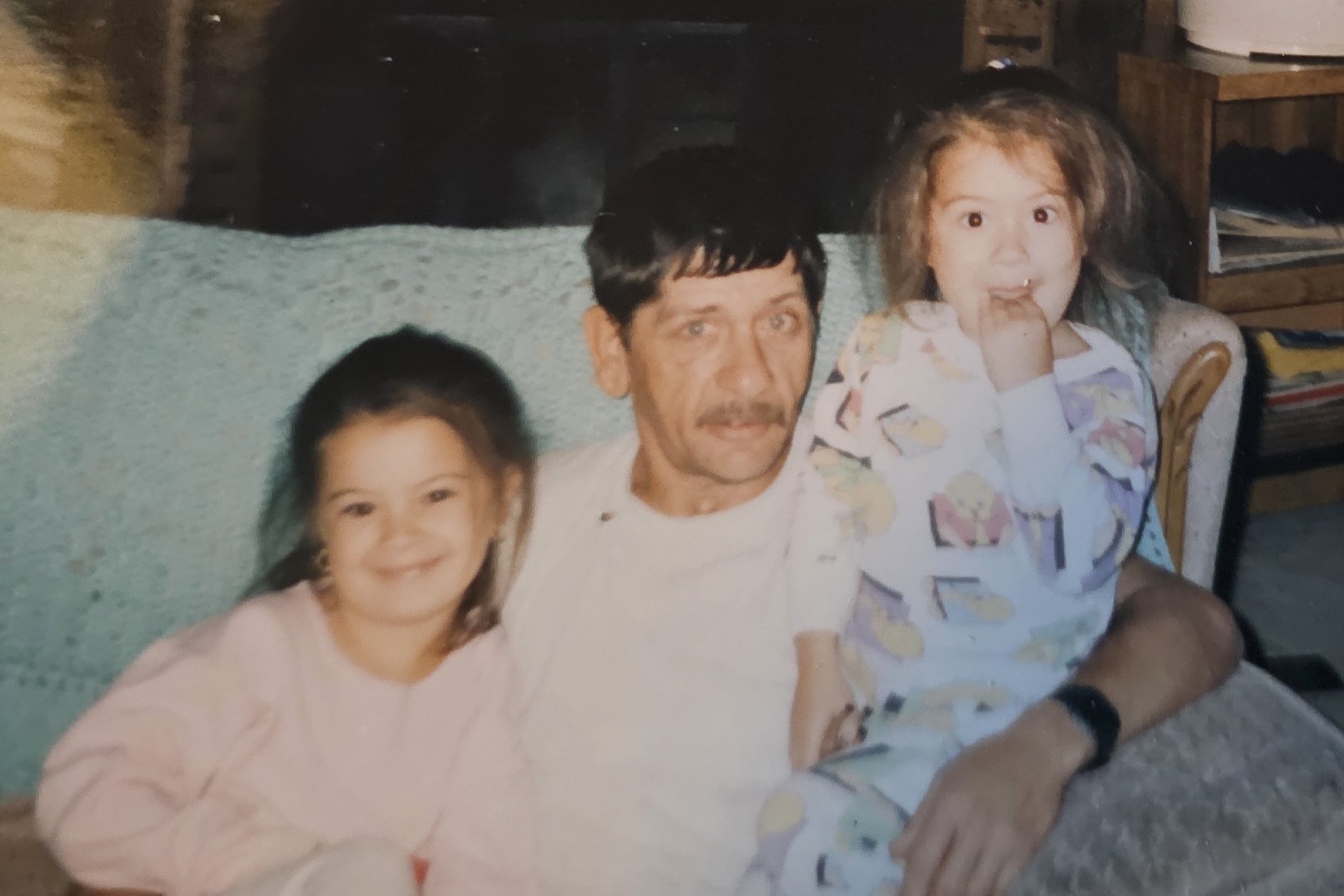 Gary with Amber and Ashley on a couch