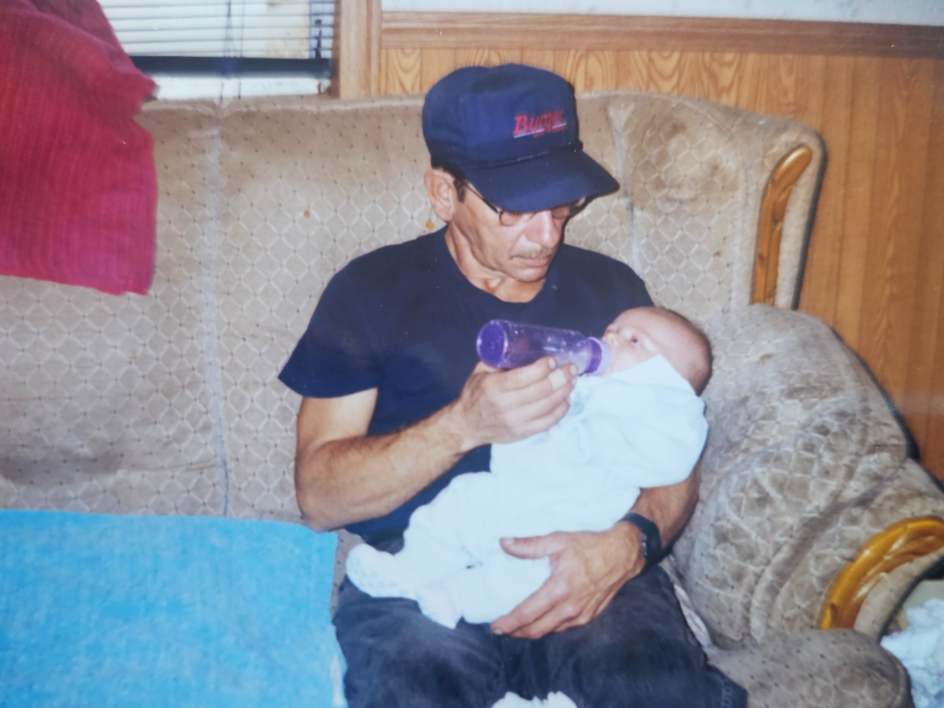 Gary feeding baby