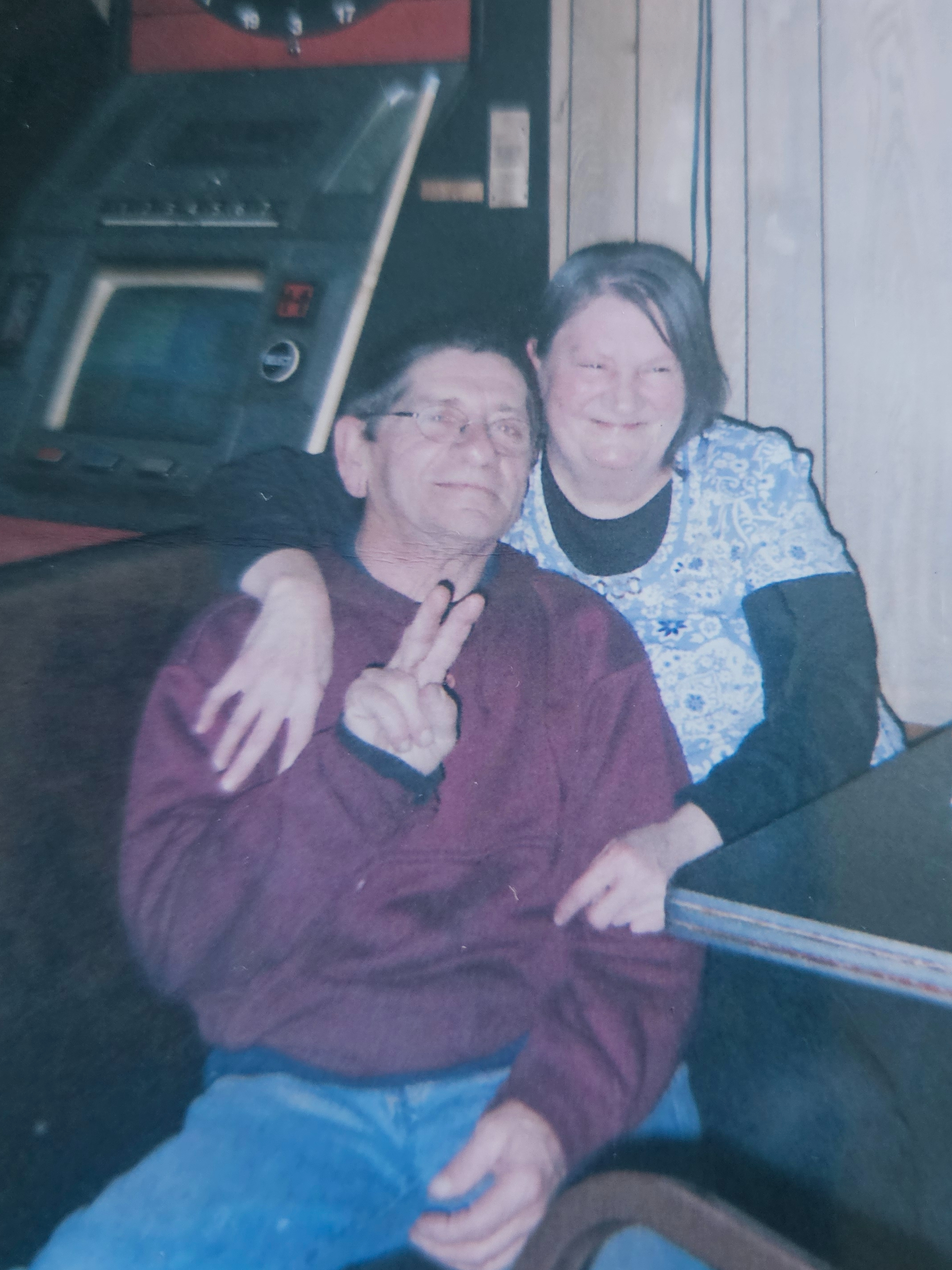 Gary and woman peace sign